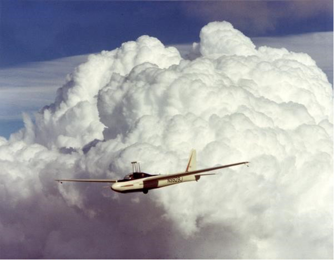 The NCAR Explorer sailplane in front of a large cumulonimbus.