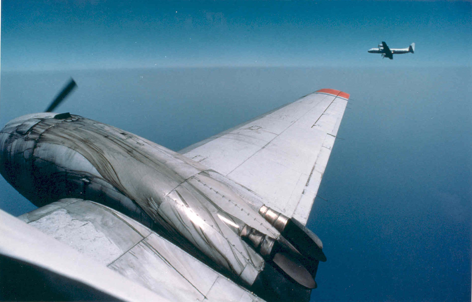 Electra aircraft flying with the UW C131A.jpg