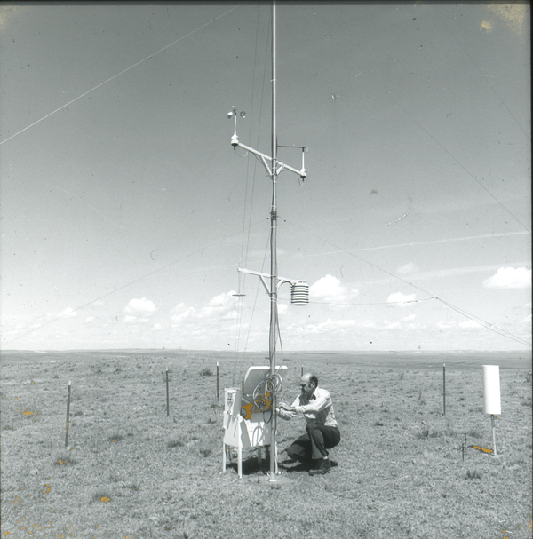 NCAR worker in field working on the National Hail Research Experiment..jpg
