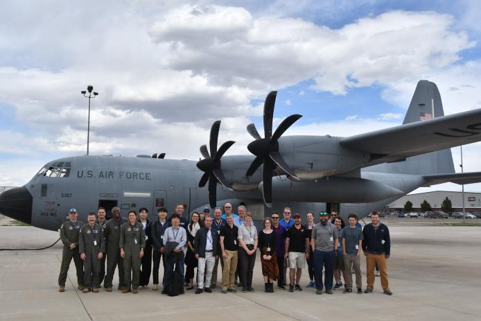 AVAPS group picture from the 2023 meeting at RAF in front of the Airforce's C130.