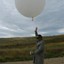 hamish_chisholm_launches_a_balloon_at_the_lauder_sq.jpg